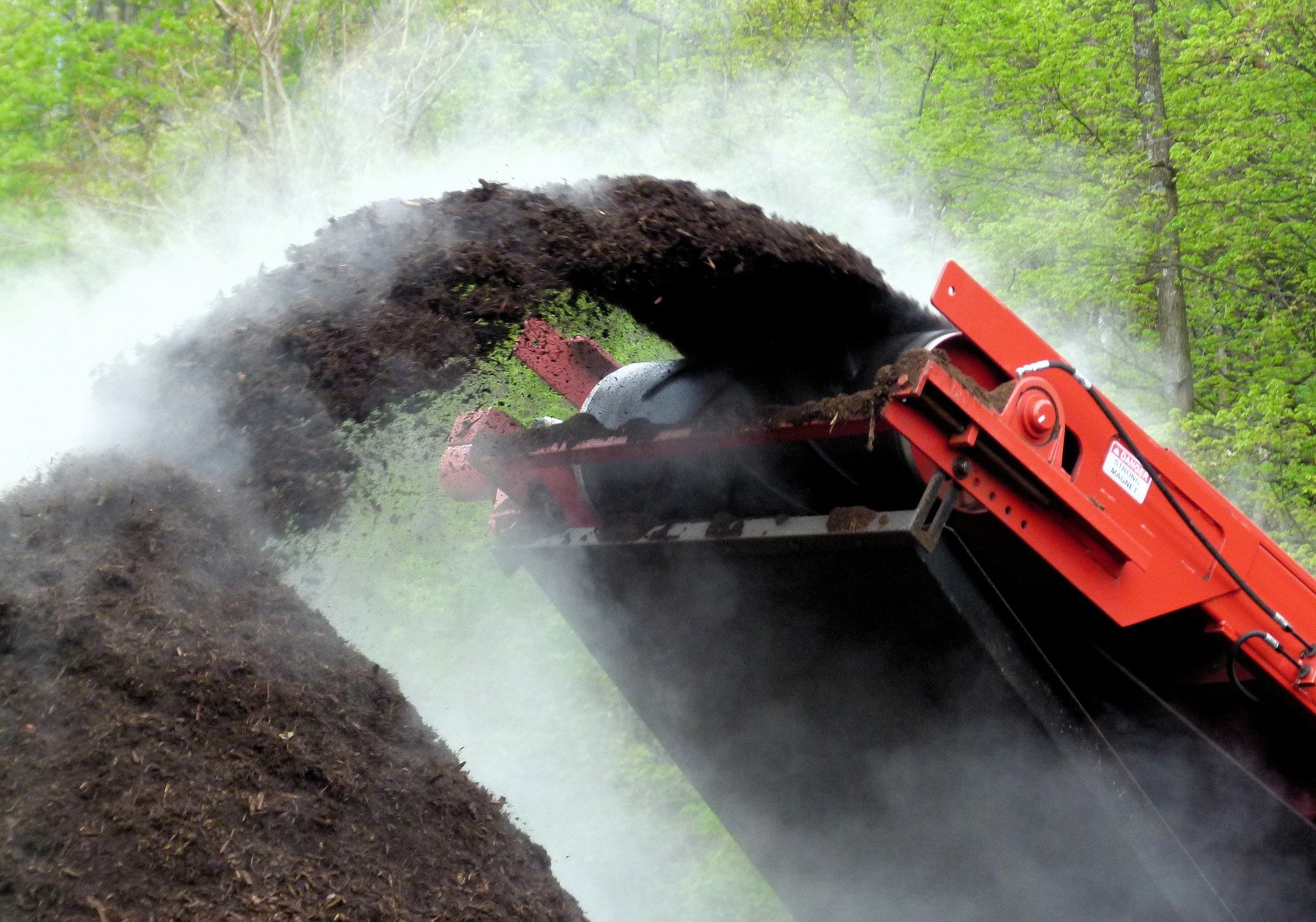 Industrial compost extraction with turning machines