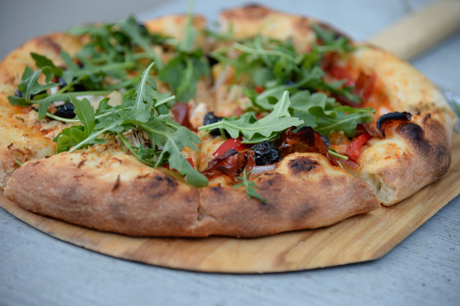 Freshly harvested rocket on pizza